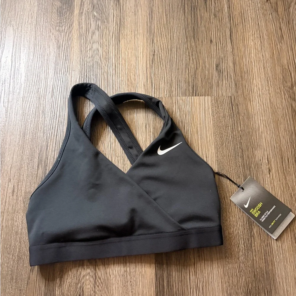 Nike Black Cross-Front Medium Support Sports Bra with White Swoosh - Picture 1 of 4